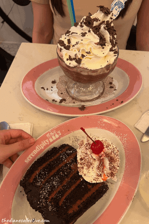 Two plates of Serendipity 3 chocolate desserts, featuring the famous Frrrozen Hot Chocolate and Chocolate Blackout Cake